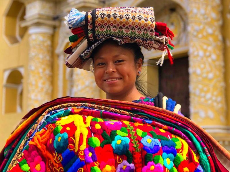 textile seller at Antigua Guatemala © 2022 Martsam Travel